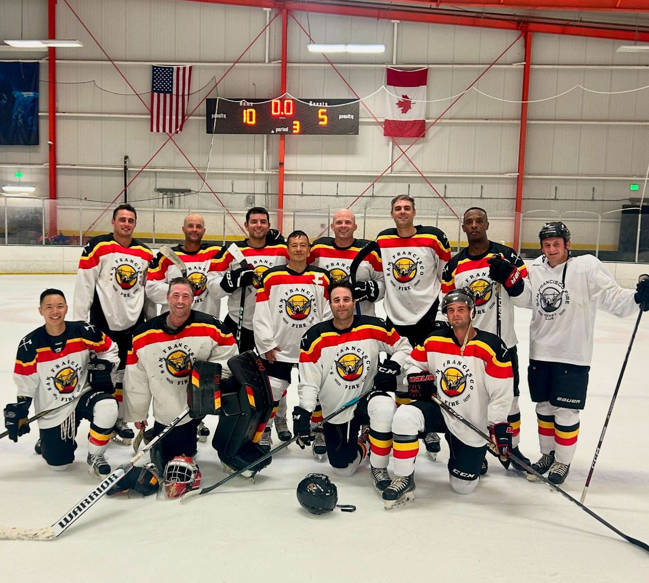 The SFFD hockey club posed on the ice in full kit